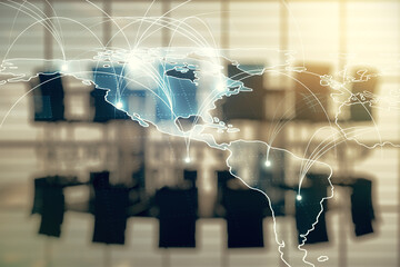 Double exposure of abstract digital world map hologram with connections on a modern boardroom background, big data and blockchain concept