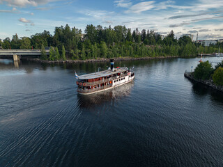 Aerial view of a steamboat heading to port in Tampere, Finland