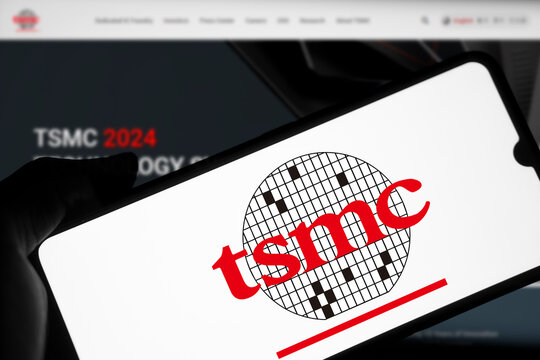 Dhaka, Bangladesh- 10 March 2024: TSMC logo is displayed on smartphone. Taiwan Semiconductor Manufacturing Company Limited (TSMC) is a Taiwanese multinational semiconductor manufacturing company.