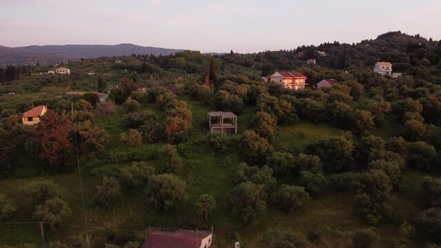 Beautiful hills with houses during suset