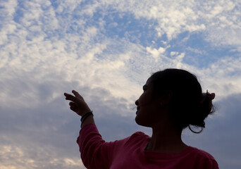 a girl watching on sky with sky view 