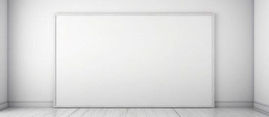 A white room with a single picture frame hanging on the wall. The room is devoid of any furniture or decorations, creating a minimalist and spacious atmosphere.