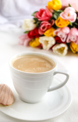 cup of coffee with flowers