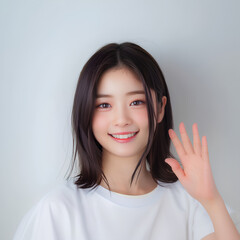 手を振る可愛い女性