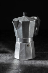 Old Mokka Italian Espresso Machine on Black Background