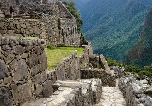 Architectural details of the characteristic stone houses in the famous Inca archaeological site of Machu Picchu located in the Andes of Peru, designated a UNESCO World Heritage Site in 1983