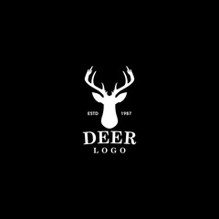 Deer head logo icon isolated on dark background