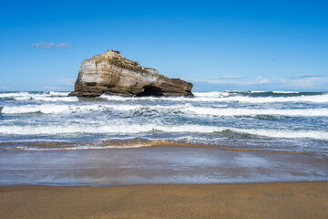 Miramar beach with its beautiful rock and waves. Biarritz, Basque Country of France. - 754967976