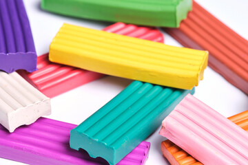 Fototapeta premium Background made bright multicolored plasticine designed for modeling and creativity.