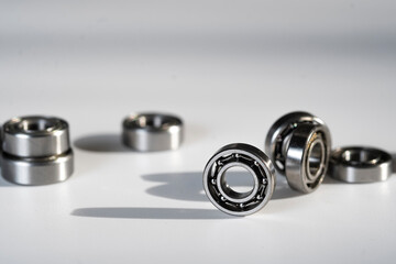 Bearing on a white background, several small bearings.