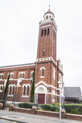 Obraz premium Gothic Grace: St Patrick’s Cathedral’s Red Brick Splendor