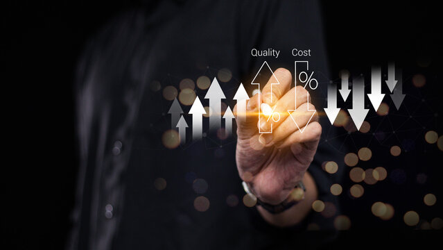 Cost and quality control, business strategy and project management concept. Businessman working on digital tablet with quality control growth graph and cost reduction, effective business