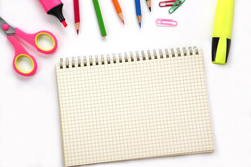School supplies and office supplies on white background. Learning, study, office equipment and presentation concept.