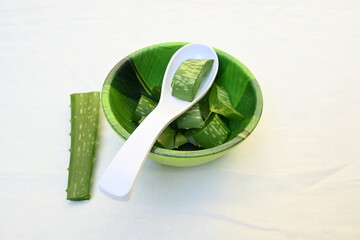 Aloe vera slices. Many Ayurvedic medicines are made using its juice. Its make topical...