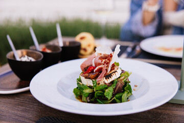 Greek salad on a plate - 755000501