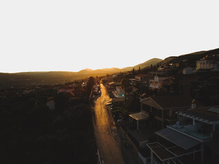 Aerial view of Sunset over a town in Kefalonia, Greece - 755000751
