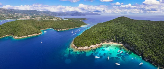 Poster Sivota - stunning aerial drone video of turquoise sea known as Blue Lagoon and white sandy beaches. Epirus, Greece summer holidays. © Freesurf
