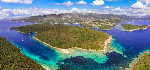 Sivota - stunning aerial drone video of turquoise sea known as Blue Lagoon and unique beach Bella...