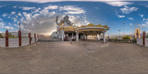 full 360 hdri panorama near tallest hindu shiva monument statue in india on mountain near ocean at...