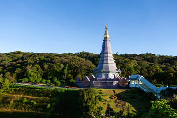 Pagoda on highest mountain in Thailand. Doi Inthanon National Park. Pra Mahatat Nopphonphusiri pagoda and forest on sunny day. Nature of North Thailand.
