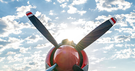 Close up on an airplane’s propeller into the sun © knowlesgallery