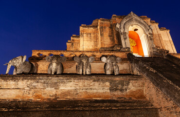 Wat Chedi Luang. Famous buddhist temple in the historical center of Chiang Mai at night. Thailand.