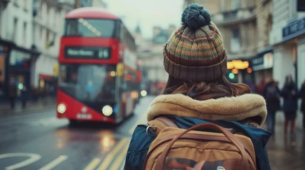 Foto op Plexiglas female tourist backpacker looking at 2 storey or double-decker red bus in  London, England. Wanderlust concept. © Tepsarit