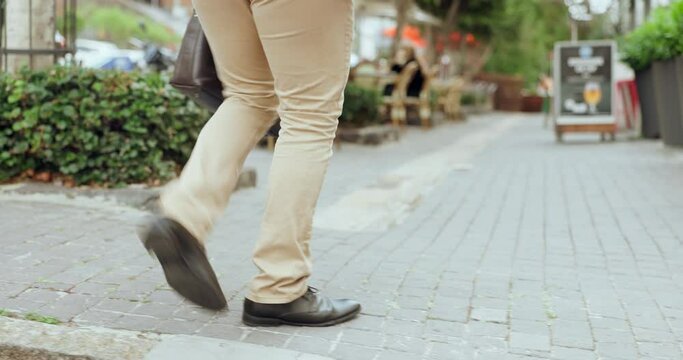 Shoes, business man and dancing in closeup, city and steps for celebration, moving and outdoor in road. Person, feet and dancer on ground with success, winning and travel in metro sidewalk in town