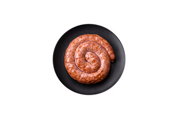 Delicious grilled sausage in the form of a ring with salt, spices and herbs - 755027300