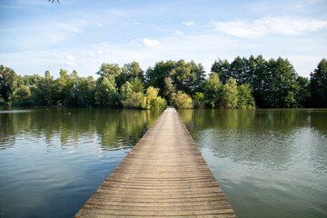 wooden bridge over lake