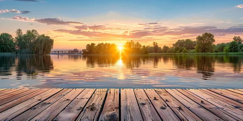 Schilderijen op glas Peaceful Sunset at the Lake with Wooden Jetty Extending into Calm Waters, Stunning Nature and Tranquility © MDRAKIBUL