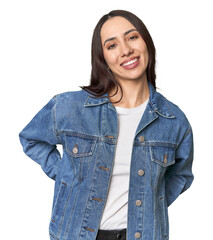 Modern young Caucasian woman portrait on studio background happy, smiling and cheerful.