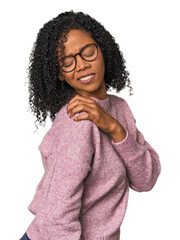 African American woman in studio setting having a shoulder pain.