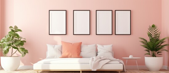 This living room features pink walls with a gallery wall of three monochrome picture frames. The room is furnished with white meditation bed furniture and decorative plants.