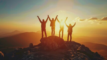 Image of 5 young men standing with their arms raised. Looking ahead on a high mountain The concept of conquering high mountain peaks that are inaccessible to most people. sunset light