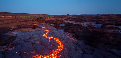 Fototapeta premium Step into a cataclysmic world of molten rock and fiery skies, as the volcanic landscape showcases nature's devastating beauty. Created with Generative AI technology