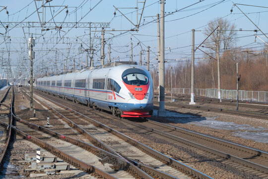 SLAVYANKA, RUSSIA - MARCH 04, 2024: Modern high-speed electric train EVS1-16 "Sapsan" on a sunny March day. Oktyabrskaya Railway