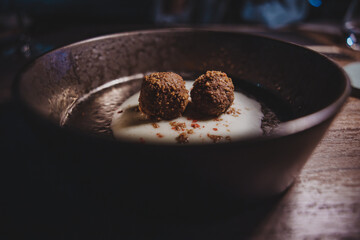 Close up of two truffles in a bowl - 755044148