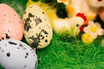 Easter eggs on green grass. Happy Easter decor. Springtime holidays. Easter toys and painted eggs. Traditional spring symbols. - 755074136