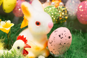 Easter bunny with hen and eggs. Happy Easter decor. Springtime holidays. Easter toys and painted eggs. Traditional spring symbols. - 755074138