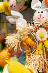 Easter bunny with flower decor. Happy Easter design. Springtime holidays. Handmade Easter toys. Traditional spring symbols. - 755074143