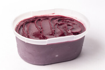 Creamy acai box on the white background, traditional brazilian food.