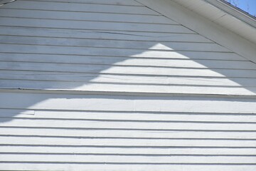 White Boards on an Exterior Wall of a House