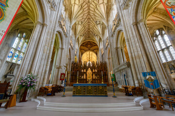 The Gothic interior of historic Winchester Cathedral also known as Cathedral Church of the Holy Trinity, Saint Peter, Saint Paul and Saint Swithun. - obrazy, fototapety, plakaty