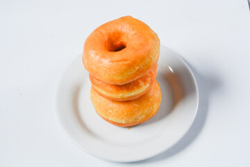 Close up of original donuts without toppings on a white background. Isolated objects