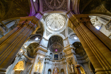 Fototapeta na wymiar The ornate interior of the Cathedral of the Incarnation, or Granada Cathedral and Capilla Real Royal Chapel, in the historic old town of Granada, Spain. 