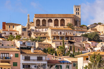 Villagescape of Selva with gothic catholic parish church Església de Sant Llorenç, Majorca,...