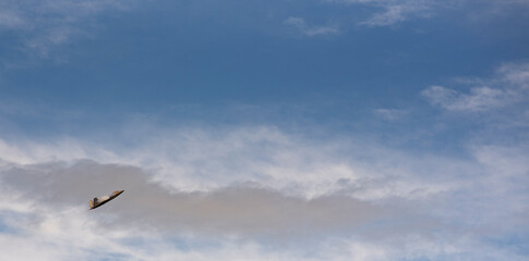 F-22 jet with wind open sky