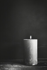 Sympathy card black and white color photo, candle, black background. Copy Space. Generative AI - obrazy, fototapety, plakaty