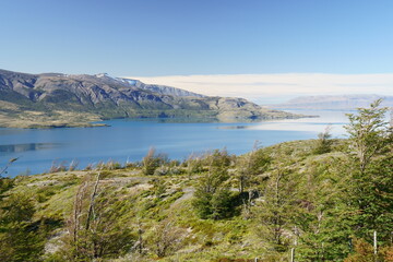 Fototapeta na wymiar Mountain view across a quiet lake